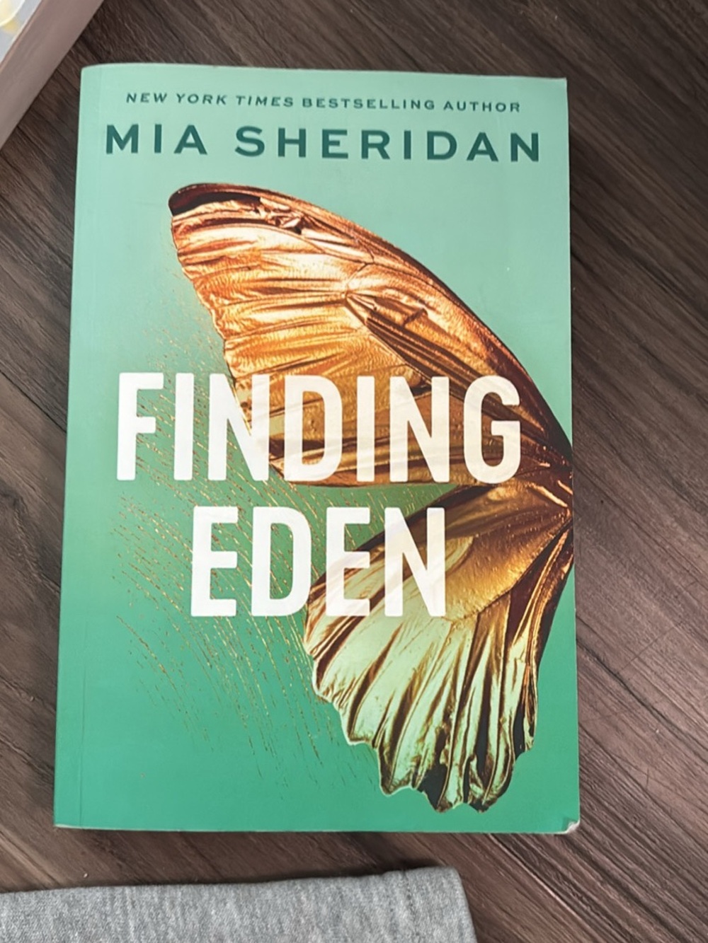 Finding Eden by Mia Sheridan — Teal & Gold Paperback
